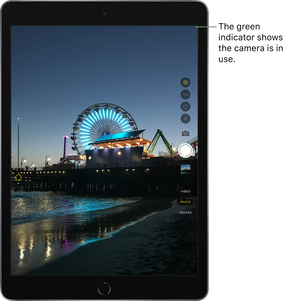 The Camera screen. A green indicator at the top right shows that the camera is in use.