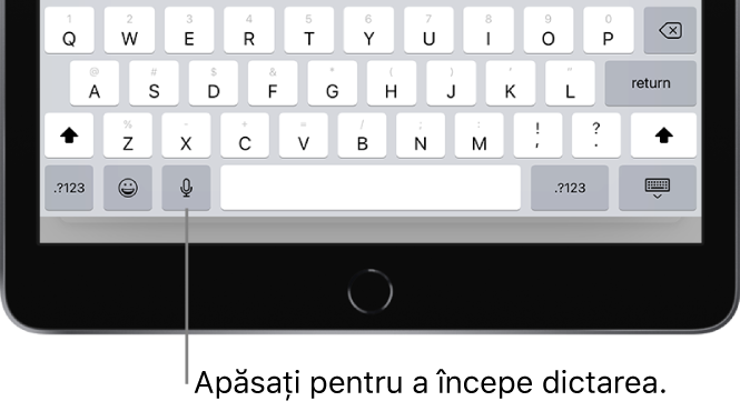 Tastatura de pe ecran afișând tasta Dictați (în stânga barei de spațiu), pe care puteți apăsa pentru a începe dictarea textului.