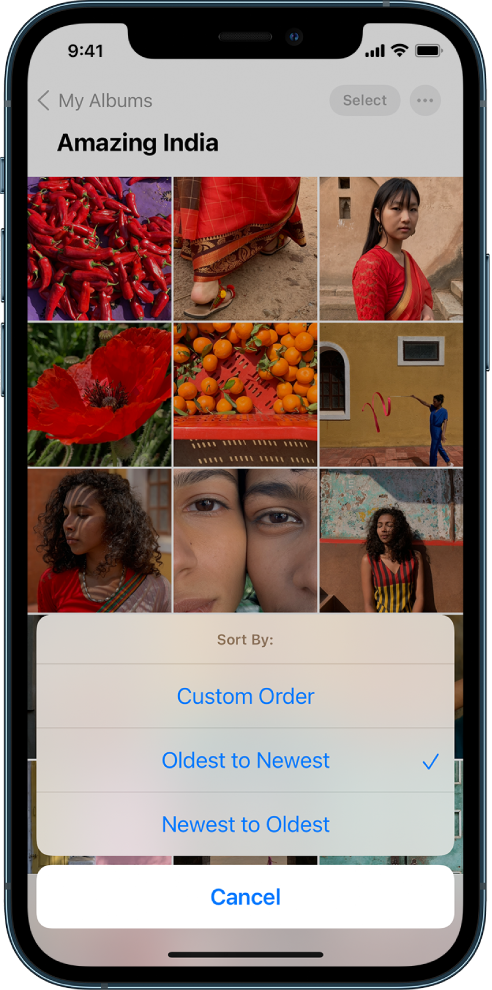 A photo album is open and the screen is full of photo thumbnails. The Sort by options are shown at the bottom half of the screen with the following options: Custom Order, Oldest to Newest, Newest to Oldest, and Cancel. Oldest to Newest is selected.