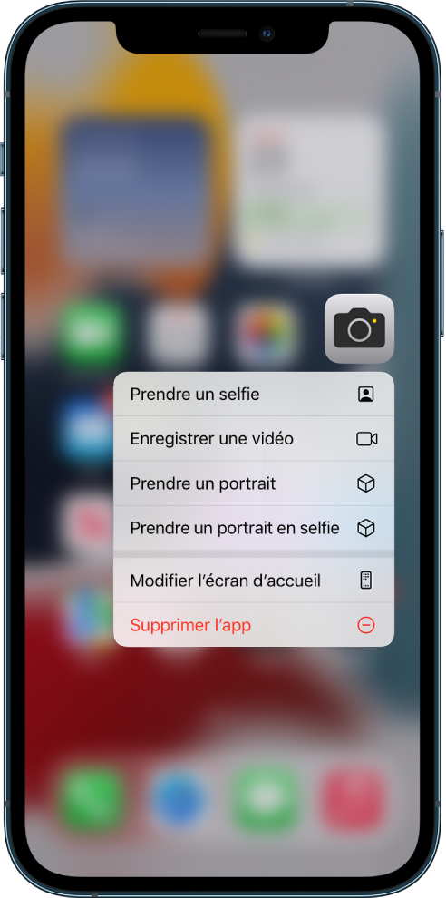 Écran d’accueil flouté, avec le menu des actions rapides de l’appareil photo s’affichant sous l’app Appareil photo.