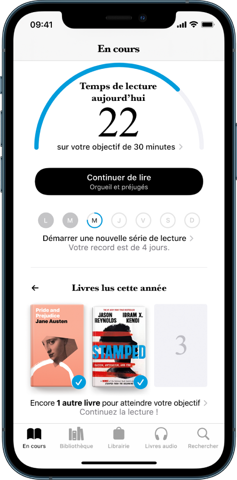 La section « Objectifs de lecture » dans « En cours ». Le compteur de lecture indique que 10 minutes ont été réalisées sur un objectif de 20 minutes. Sous le compteur se trouve un bouton « Continuez la lecture » et des cercles qui montrent les jours de la semaine, du dimanche au samedi. Un contour bleu autour d’un cercle indique la progression de la lecture pour ce jour. Au bas de la page se trouvent les couvertures des livres lus cette année.