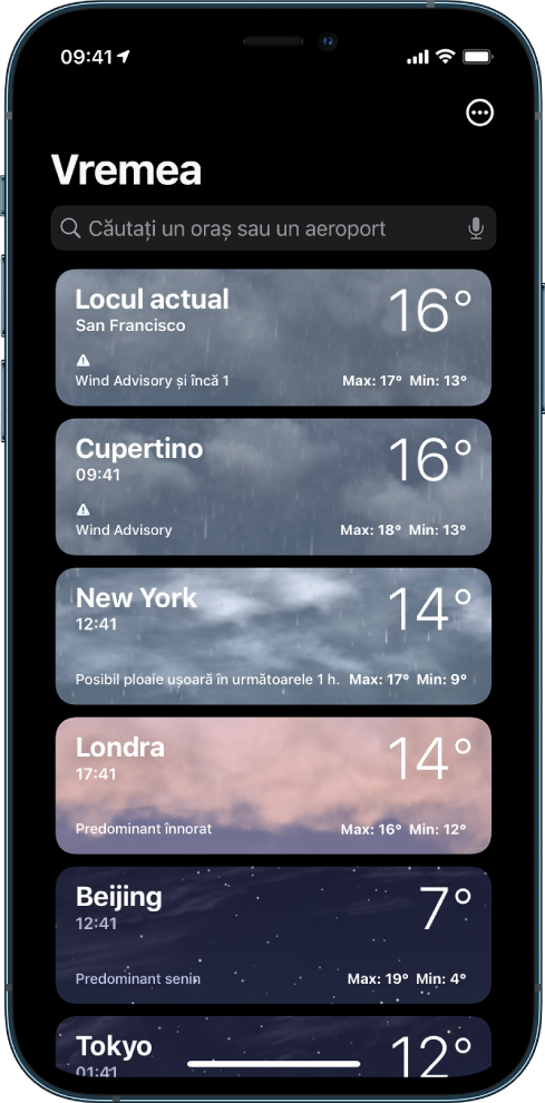 O listă de orașe afișând ora, temperatura curentă, prognoza și temperaturile maxime și minime pentru fiecare oraș. În partea de sus a ecranului este câmpul de căutare, iar în colțul din dreapta sus este butonul Mai multe.