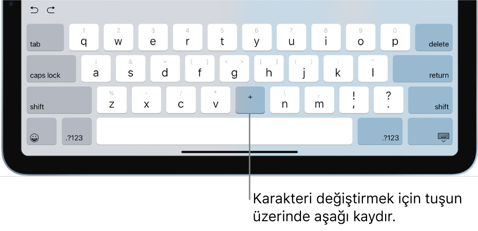 Kullanıcı B tuşunu aşağı kaydırdıktan sonra bu tuşun bir artı işaretine değiştirildiğini gösteren klavye.
