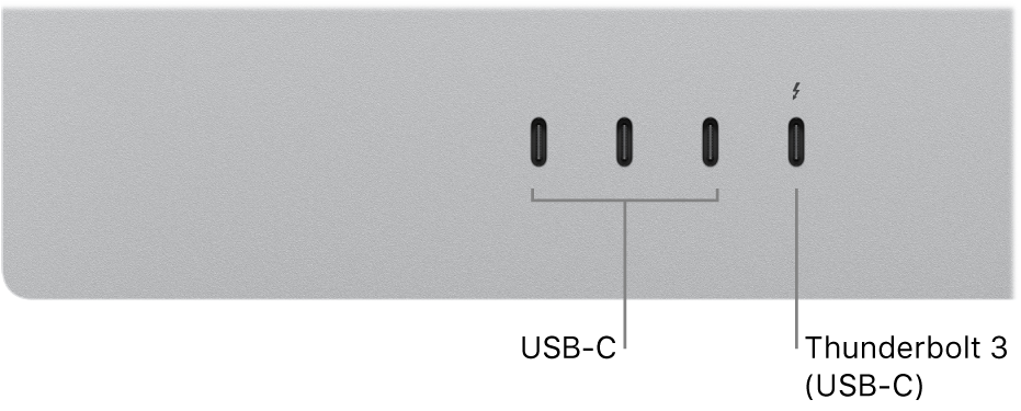 Nærbillede af bagsiden af Studio Display med tre USB-C-porte til venstre og en Thunderbolt 3-port (USB-C) til højre for dem.