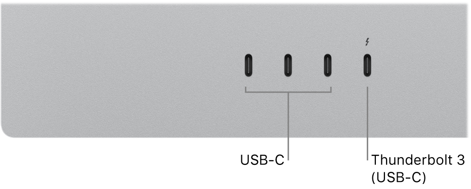 Acercamiento de la parte posterior del monitor Studio Display mostrando tres puertos USB-C a la izquierda, y un puerto Thunderbolt 3 (USB-C) a la derecha.
