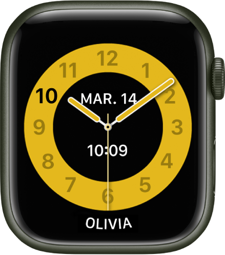 Cadran Mode École affichant une horloge analogique avec la date et l’heure près du milieu. Le nom de la personne qui utilise l’Apple Watch se trouve en bas.