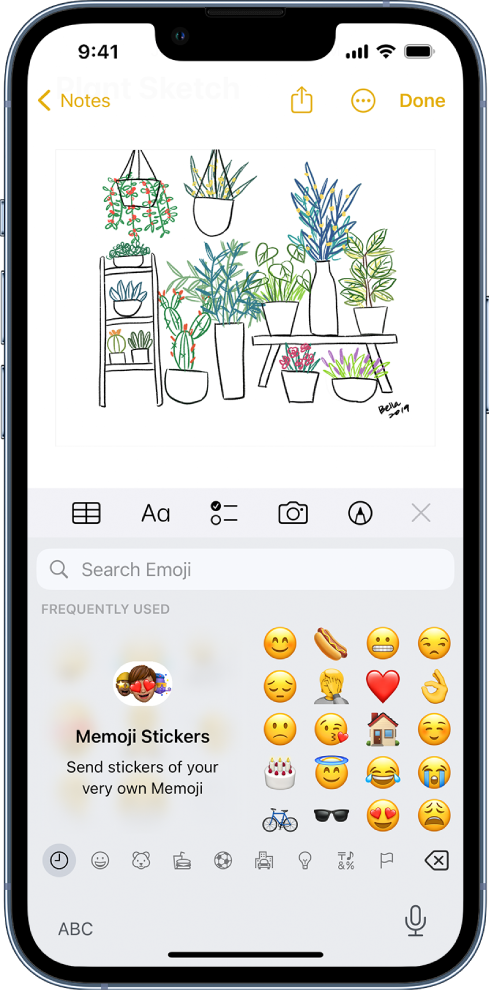 A note in the Notes app being edited, with the emoji keyboard open and the Search Emoji field at the top of the keyboard.