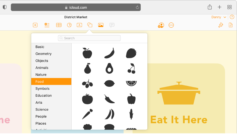 تكون مكتبة الأشكال مفتوحة، مع قائمة فئات الأشكال للاختيار من بينها. يتم تحديد فئة "الطعام" وتظهر صور أشكال الطعام للاختيار من بينها على يسار الفئة.