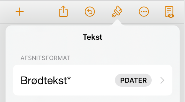 Afsnitsformatet Brødtekst med en stjerne og knappen Opdater til højre.
