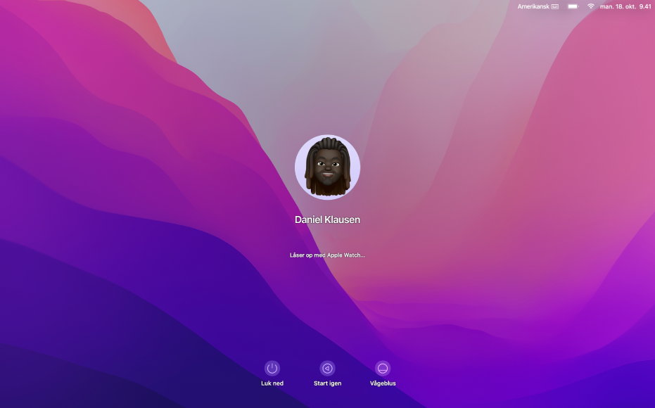 Skærmen Lås automatisk op med en besked midt på skærmen om, at Mac låses op af Apple Watch.