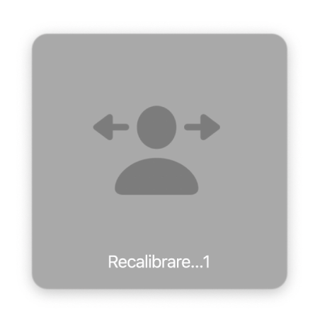 Numărătoarea inversă de pe ecran pentru recalibrarea cursorului controlat cu capul, cu textul “Recalibrare…1”.