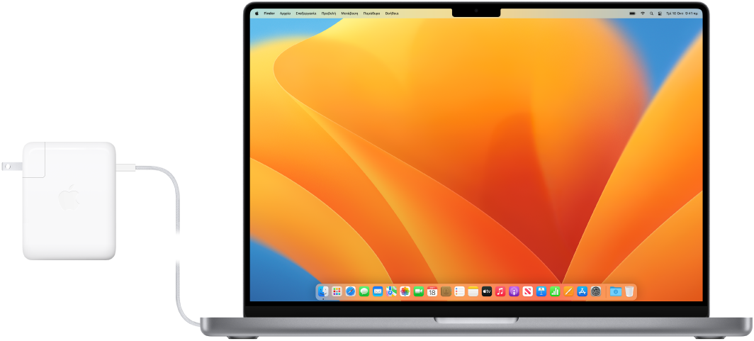 MacBook Pro 16 ιντσών με συνδεδεμένο το τροφοδοτικό.