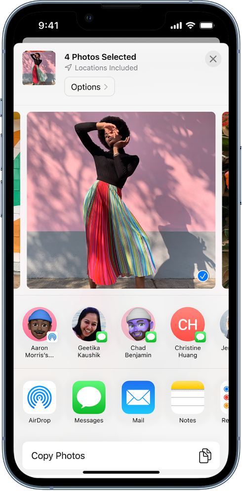 The sharing screen with a selected photo at the top, indicated by a white checkmark in a blue circle. The row beneath the photo shows suggested contacts to share with. Below that are other sharing options, including, from left to right, AirDrop, Messages, Mail, and Notes. At the bottom of the screen is the Copy Photos button.