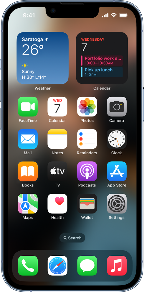 Hjem-skjermen på iPhone med Mørk modus slått på.
