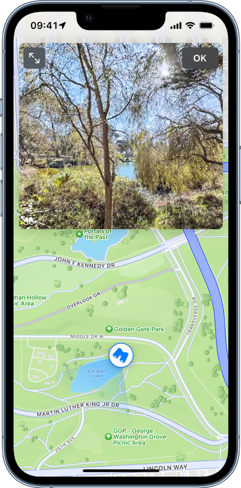 Aparece uma passadeira para peões por cima de um mapa da zona. O ícone de “Olhe à sua volta” sobreposto nos pontos do mapa na direção da vista.
