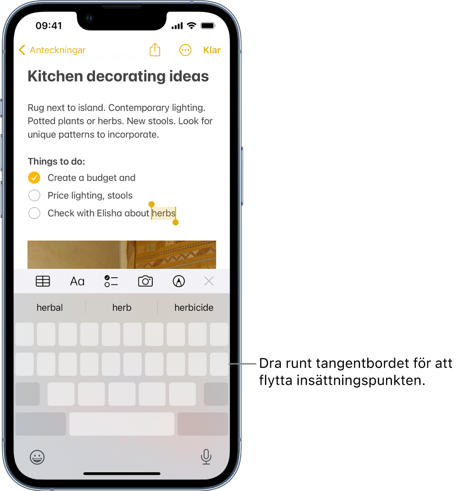 En anteckning som redigeras efter att tangentbordet har förvandlats till en styrplatta. Tangentbordet är nedtonat för att visa att det nu fungerar som en styrplatta.
