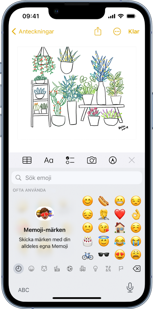 En anteckning i appen Anteckningar redigeras. Emoji-tangentbordet är öppet och ovanför tangentbordet finns sökfältet för emojier.
