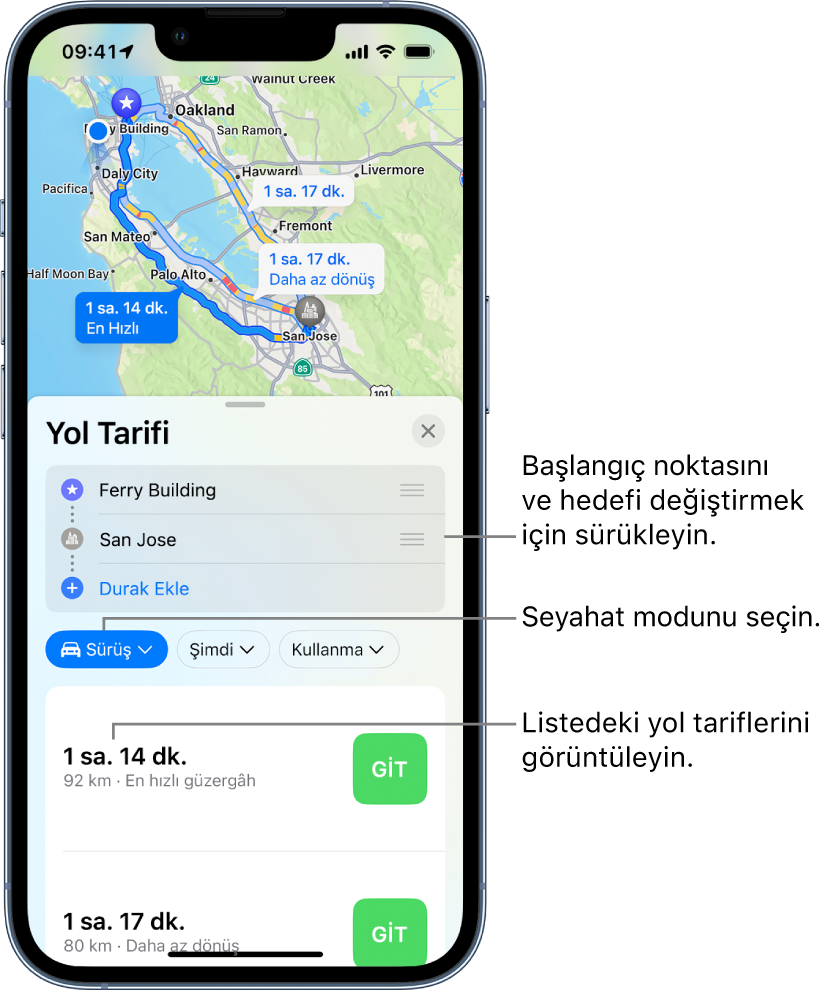 İki konum arasında birden fazla sürüş güzergâhını gösteren bir harita. Başlangıç noktasını ve hedefi değiş tokuş etme, başka seyahat modları seçme ve yol tarifini liste olarak görüntüleme seçenekleri var.