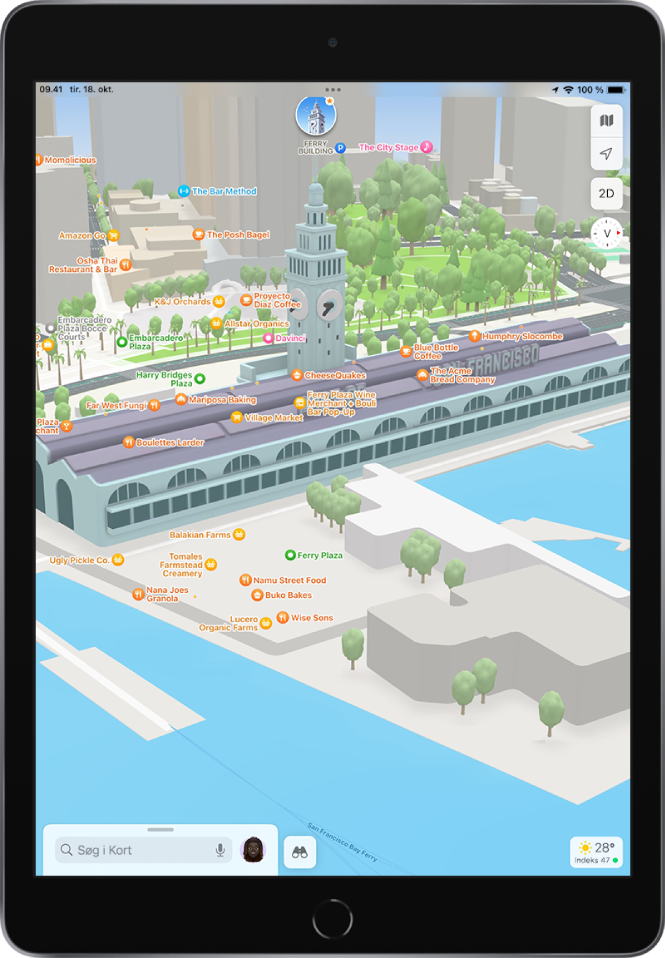 Et bykort i 3D, der viser bygninger, gader, en færgeoverfart, vand, træer og en park.