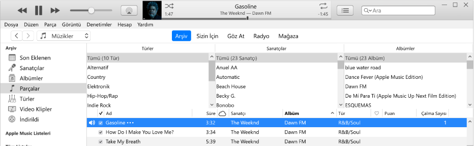 iTunes ana penceresi: Kenar çubuğunun sağında ve parça listesinin üstünde sütun tarayıcı vardır.