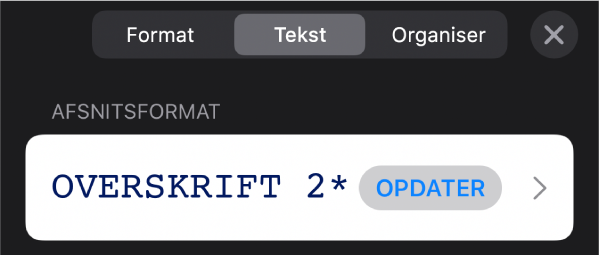 Et afsnitsformat med en stjerne og knappen Opdater til højre.