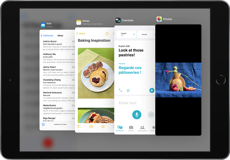 Four apps open in Slide Over windows, including Mail, Notes, Translate, and Photos.