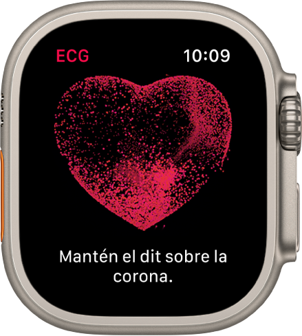 L’app ECG mostra la imatge d’un cor amb les paraules “Mantén el dit sobre la corona”.