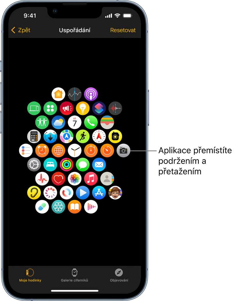Obrazovka Uspořádání v aplikaci Apple Watch s ikonami uspořádanými v mřížce.