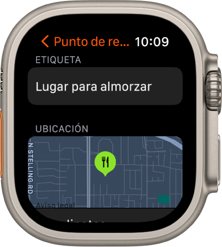 La app Brújula muestra una pantalla que permite la edición de un punto de referencia. El campo Etiqueta está en la parte superior. Debajo está el área Ubicación que muestra la ubicación del punto de referencia en un mapa. El símbolo de un comedor se aplicó al punto de referencia