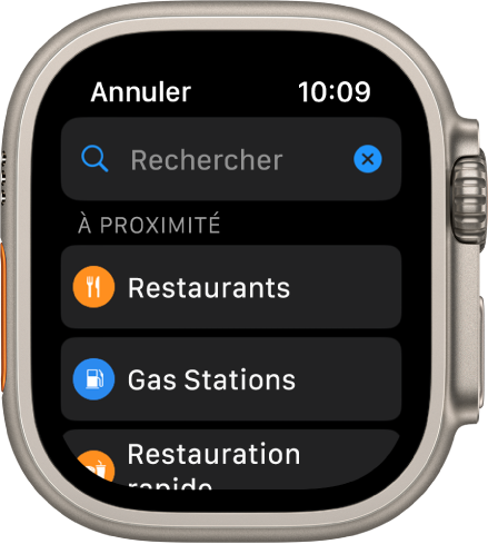 L’écran Rechercher de l’app Plans, avec le champ Rechercher affiché vers le haut. Sous « À proximité » figurent des boutons pour des restaurants, des stations-service et des fast-foods.