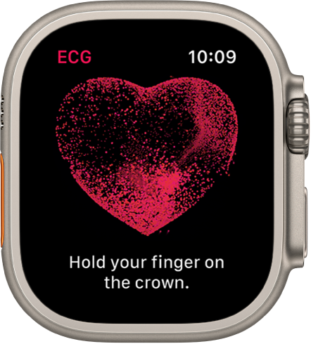 Lietotnē ECG redzams sirds attēls ar uzrakstu “Hold your finger on the crown.”