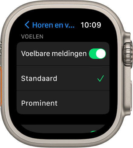 Instellingen voor horen en voelen op de Apple Watch, met de schakelaar 'Voelbare meldingen' en daaronder de opties 'Standaard' en 'Prominent'.