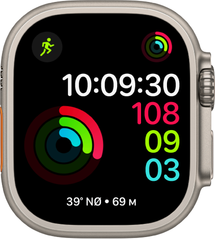 Urskiven Digital aktivitet som viser klokken i tillegg til framgangen for Bevegelse-, Trening- og Oppreist-målene. Det er også tre komplikasjoner: Trening øverst til venstre, Aktivitet øverst til høyre, og Kompass-komplikasjonen nederst.