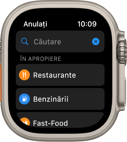 Ecranul Căutare din aplicația Hărți, afișând câmpul de căutare lângă partea de sus. Sub În apropiere se află butoanele pentru restaurante, benzinării și fast food.