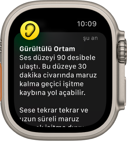 Ekranında Gürültü bildirimi gösteren Apple Watch. Bildirimle ilişkili uygulamanın simgesi sol üstte görünür. Uygulamada açmak için bu simgeye dokunabilirsiniz.