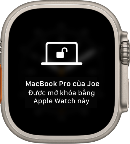 Màn hình Apple Watch đang hiển thị thông báo: “Đã mở khóa MacBook Pro của Joe bằng Apple Watch này”.