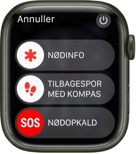 Der vises tre mærker på skærmen på Apple Watch: Nødinfo, appen Kompas med Find tilbage og Nødopkald SOS. Afbryderknappen er placeret øverst til højre.