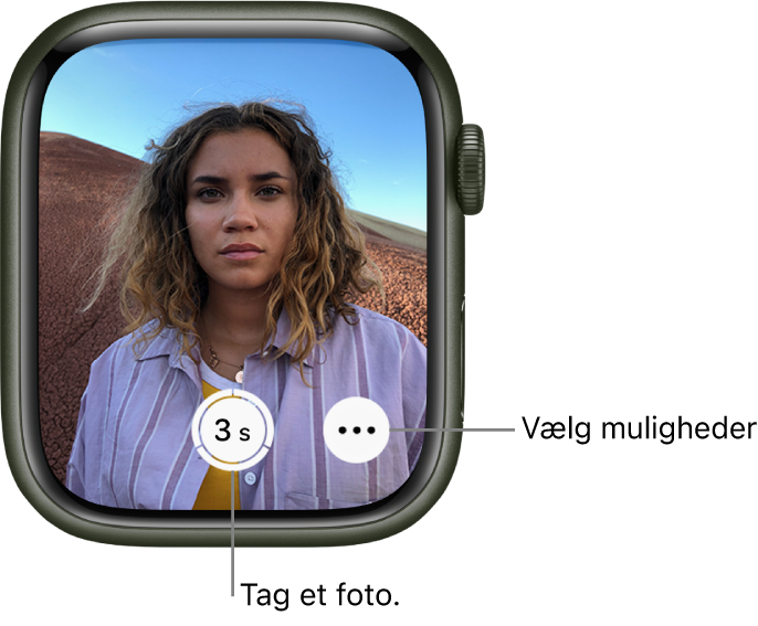 Når Apple Watch bruges som kamerafjernbetjening, vises billedet fra iPhone-kameraet på skærmen. Knappen Tag billede nederst i midten med knappen Flere indstillinger til højre for den. Hvis du har taget et foto, vises knappen Fotofremviser nederst til venstre.