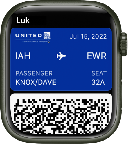 En flybillet vises i appen Wallet. Oplysningerne om flyvningen findes øverst, og der er en stregkode nederst.