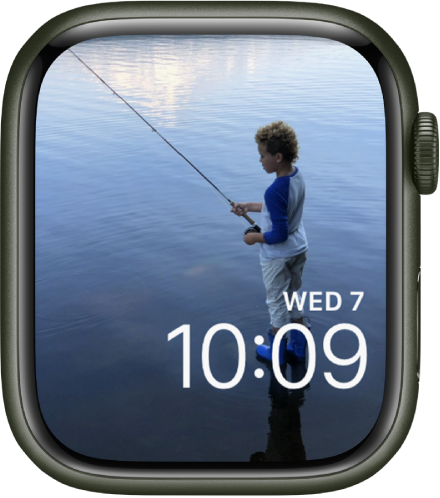 The Photos watch face shows a photo from your synced photo album. The date and time is near the bottom right.