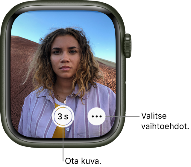 Kun Apple Watchia käytetään kameran etätoimintoon, sen näytöllä on iPhonen kameran näkymä. Ota kuva -painike on alhaalla keskellä ja Lisävalinnat-painike sen oikealla puolella. Jos olet ottanut kuvan, Kuvien katseluikkuna -painike näkyy alhaalla vasemmalla.