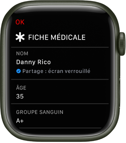 L’écran « Fiche médicale » de l’Apple Watch affichant le nom, l’âge et le groupe sanguin d’un utilisateur. Une coche est affichée sous le nom. Elle indique que la fiche médicale est partagée sur l’écran verrouillé. Un bouton OK se trouve en haut à gauche.