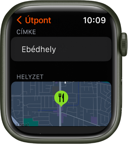 Az Iránytű app az útpontok szerkesztéséhez használható képernyővel. A képernyő felső részén a Címke mező látható. Alatta egy Hely nevű terület található, amelyen az útpont helye jelenik meg egy térképen. Az útponton az étkezés szimbólum lett alkalmazva.
