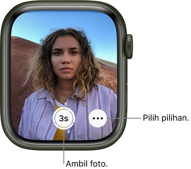 Semasa digunakan sebagai kawalan jauh kamera, skrin Apple Watch menunjukkan paparan kamera iPhone. Butang Ambil Gambar di tengah bawah manakala butang Pilihan Lanjut di kanannya. Jika anda sudah mengambil gambar, butang Pemapar Foto di bahagian kiri bawah.