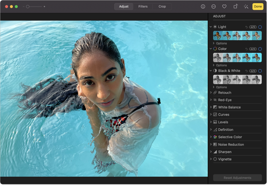 A photo in editing view, with Adjust selected in the toolbar and adjustment tools on the right.