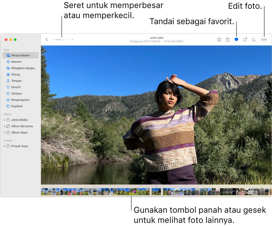 Jendela Foto menampilkan foto yang diperbesar di sebelah kanan dengan baris gambar mini di bawah. Bar alat di bagian menyertakan penggeser Zoom, tombol Favorit, dan tombol Edit.