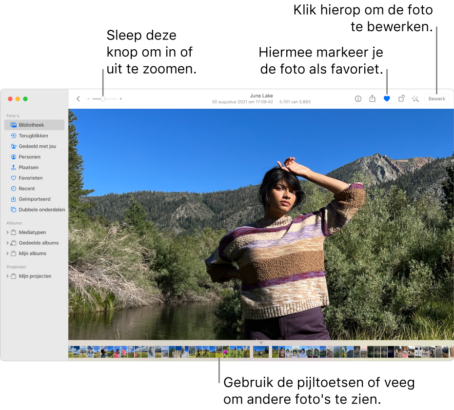 Het Foto's-venster met een vergrote foto aan de rechterkant met daaronder een rij met miniaturen. De knoppenbalk bovenin bevat de zoomschuifknop, de favorietenknop en de knop 'Bewerk'.