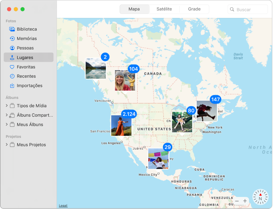 A janela do Fotos exibindo um mapa com miniaturas de fotos agrupadas por localização.