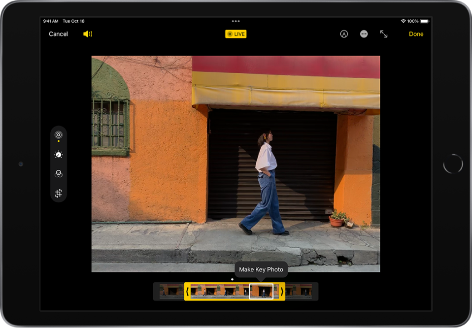 A Live Photo is in the center of the Edit screen. The Live Photo frame viewer is at the bottom of the screen. The Cancel and Volume buttons are in the top-left corner, the Live Photo button is in the top center, and the Mark Up, Enter Full Screen and Done buttons are in the top-right corner. The editing tools are on the left side of the screen: from the top to bottom, Live Photo, Adjust, Filters, and Crop. Live Photo is selected.