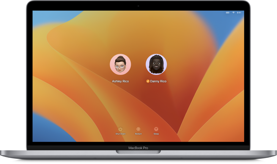 Bureau Mac qui affiche un écran de connexion avec deux comptes d’utilisateur.